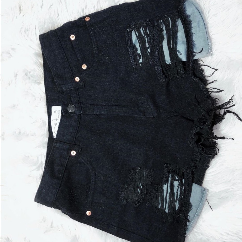 High waisted, distressed shorts